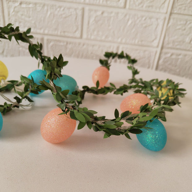 Elegant Easter rattan string lights featuring pastel egg bulbs, adding warmth and charm to any room, party, or outdoor space.