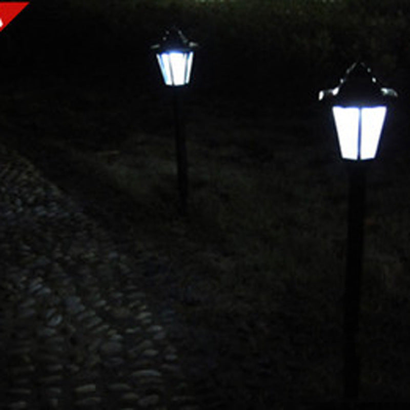 Outdoor LED wall lamp installed on a house exterior, enhancing security and aesthetics.


